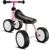 Babycykel - Pukylino - Retro rosé från PUKY har en kompakt, rosa och svart design med fyra solida, tjocka däck och en bekväm svart sits. Inspirerad av PUKYlinos barnvänliga ergonomi, har den ett snyggt svart styre och en strömlinjeformad ram idealisk för små barn. De vita däcken är accentuerade med svarta slitbanor.