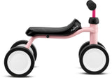 Babycykel - Pukylino - Retro rosé från PUKY är en barnvänlig, ergonomiskt designad leksakscykel med fyra hjul. Den har en rosa ram, svart sits och svarta och vita hjul. Styret är enkelt och lätt att greppa, vilket gör det idealiskt för att hjälpa ditt barn att utveckla sitt balanssinne.