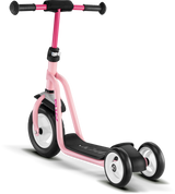 PUKY Sparkcykel - Skumhjul - Rosé - Puky R1 är en trehjulig barnskoter i rosa och svart, med ett svart styre och en stadig plattform. Designad för att förbättra balansen, den har ett större framhjul och två mindre bakhjul för stabilitet.